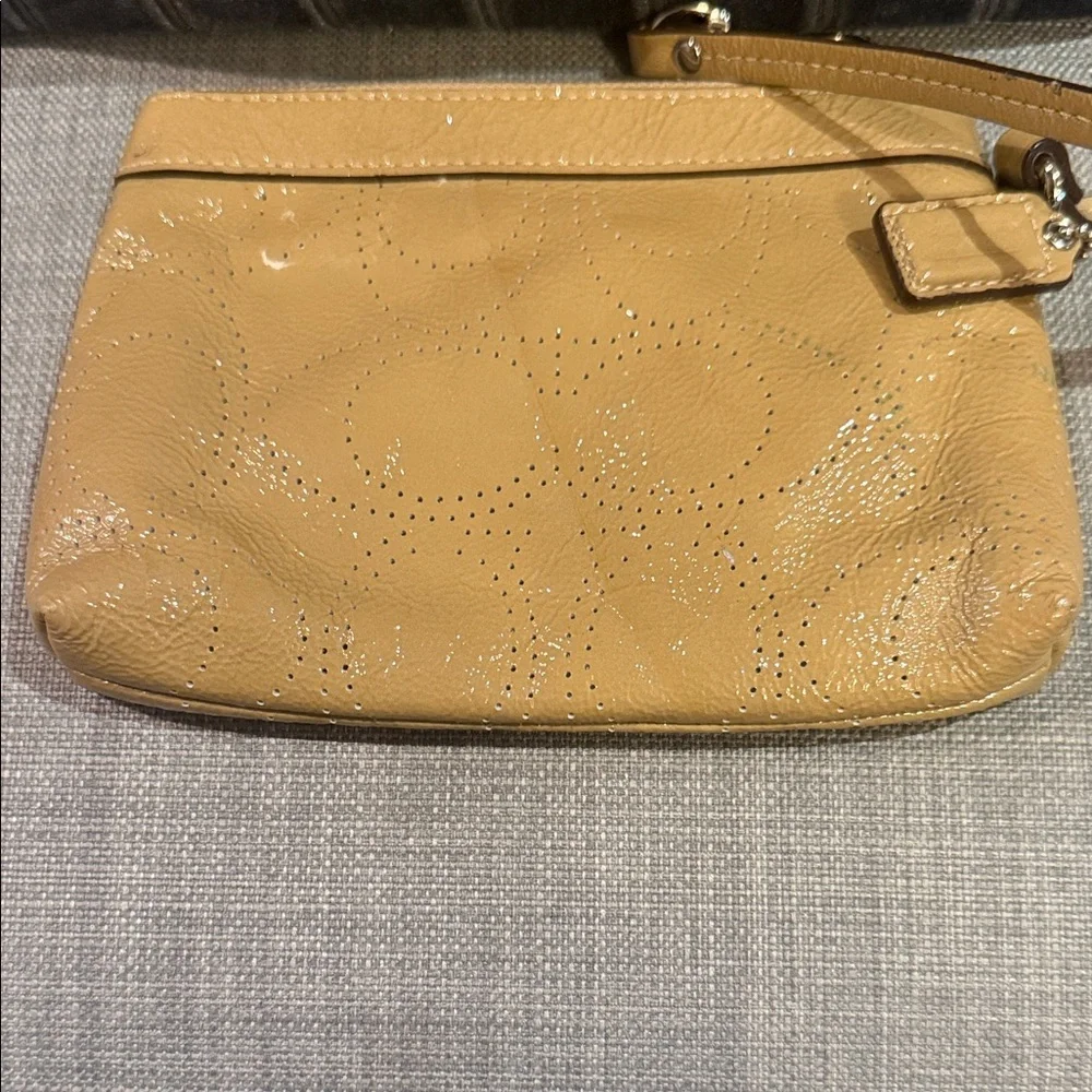 Coach Perforated Signature Gold Leather Wristlet